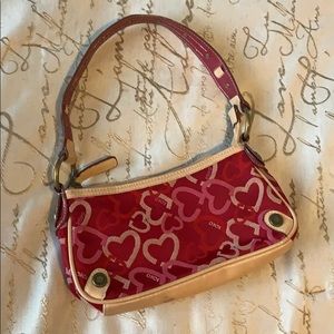 Red, cream, and pink xoxo clutch purse 😍😍😍